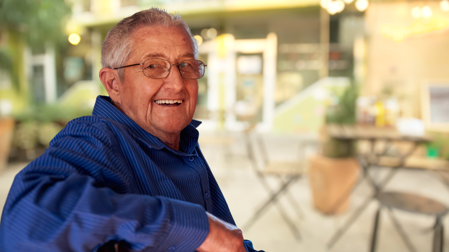 Smiling elderly man in a casual setting