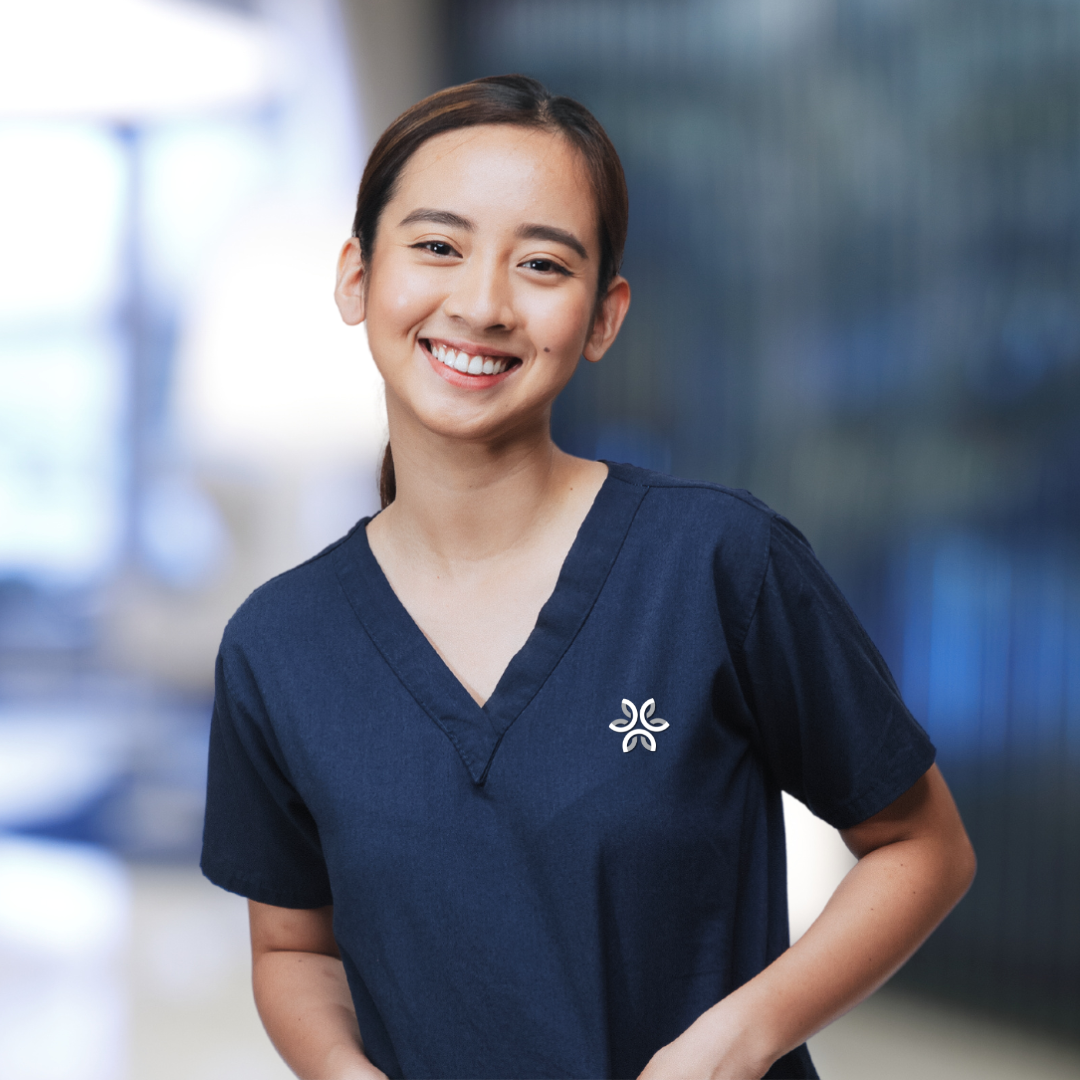 Smiling female staff member in a healthcare setting