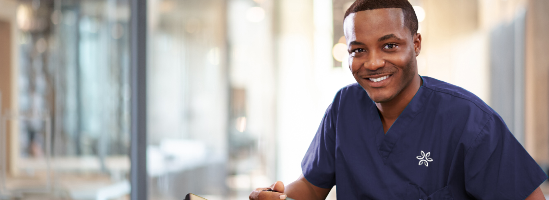 Smiling healthcare worker in a facility
