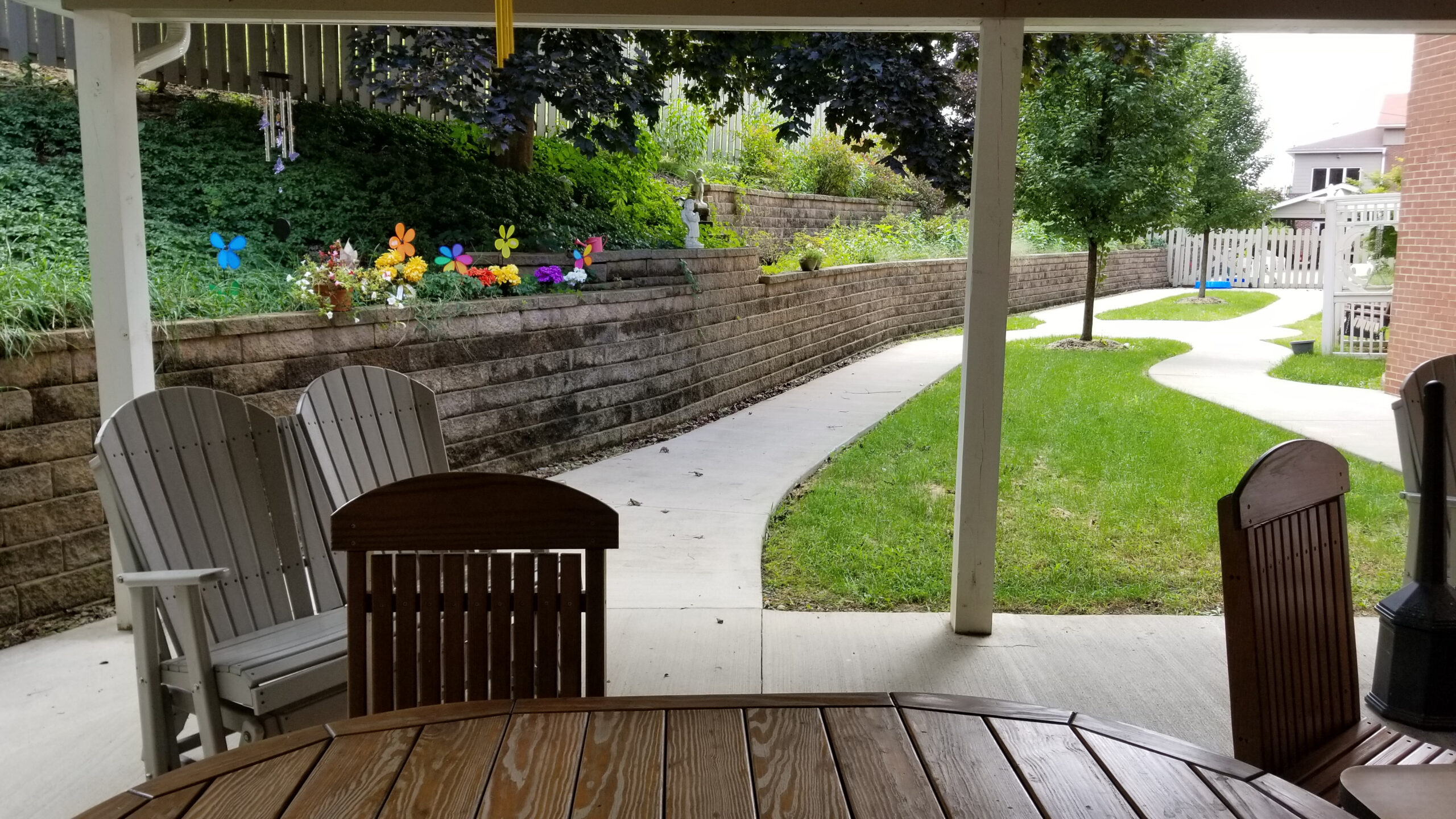 Outdoor patio area with colorful decorations and seating.