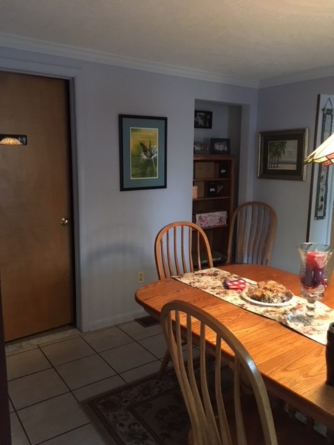 Cozy dining area with wooden table and decor