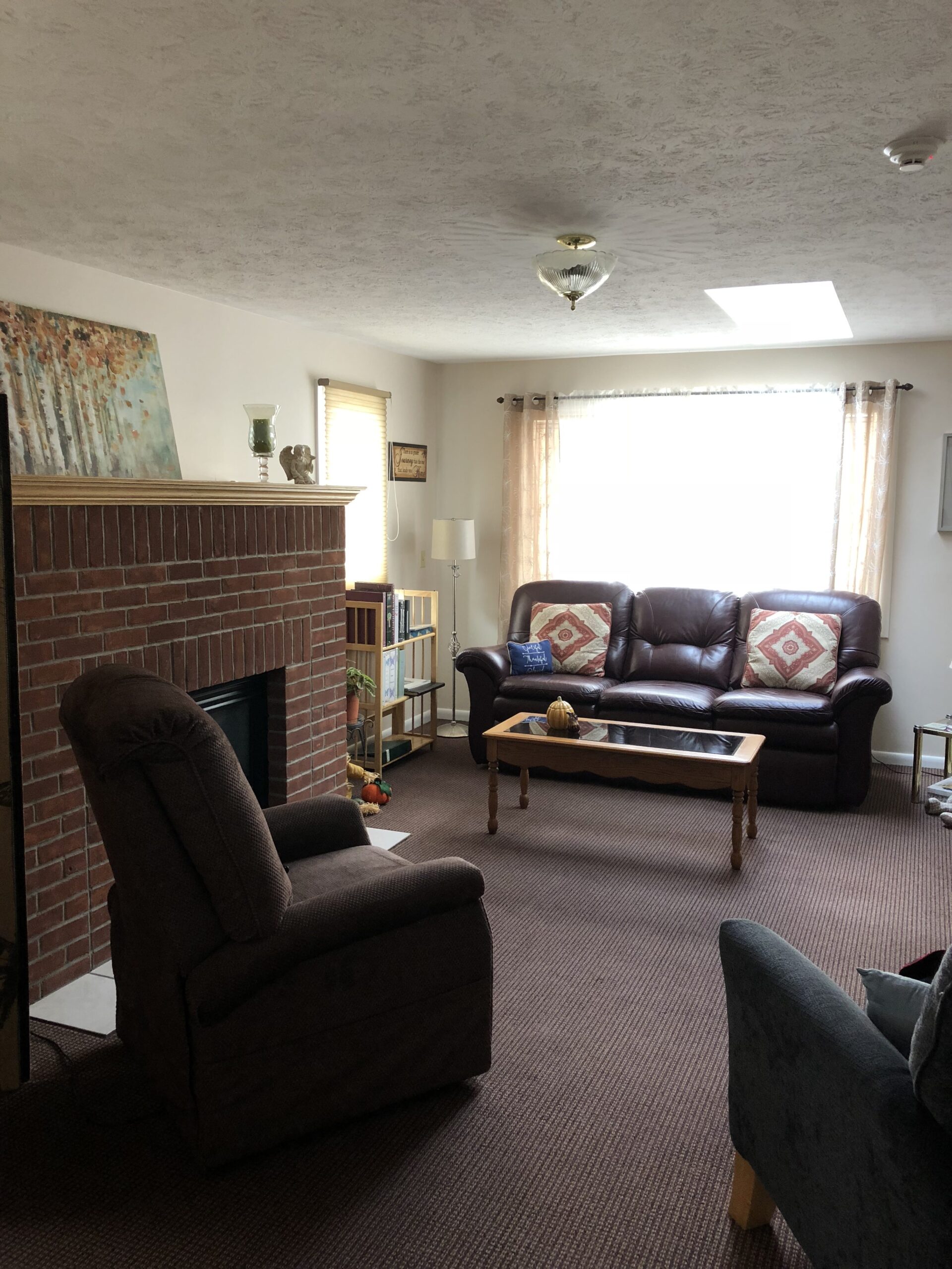 Cozy common area with seating and natural light