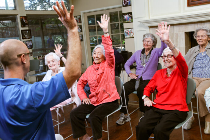Residents engaged in a group activity in a common area