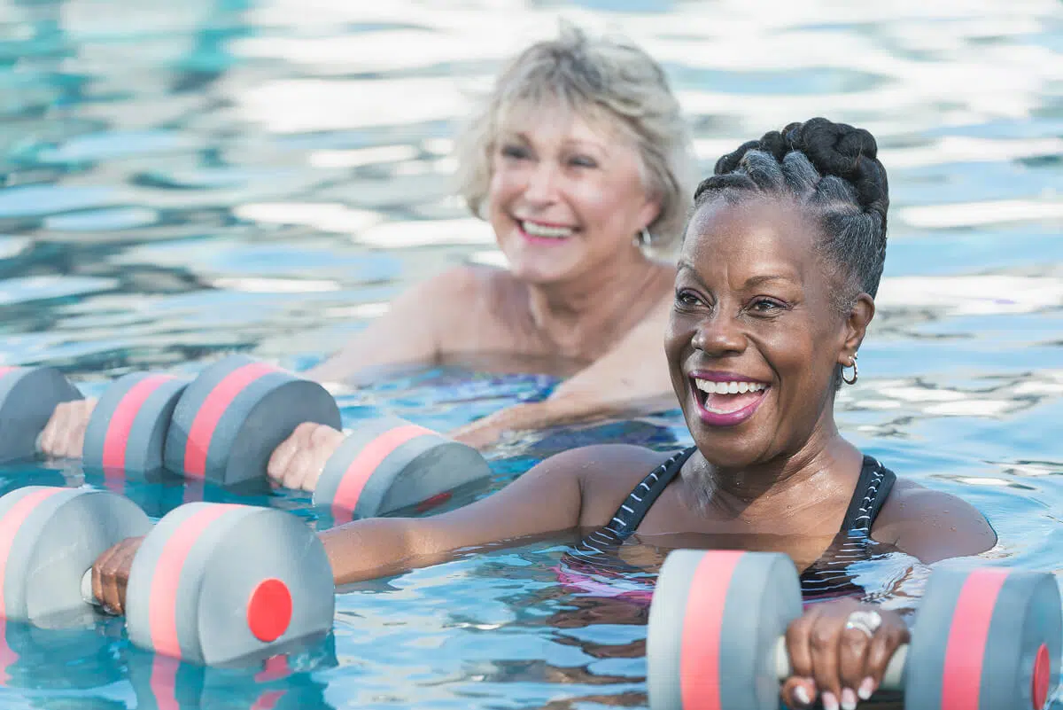 Seniors participating in a water exercise class
