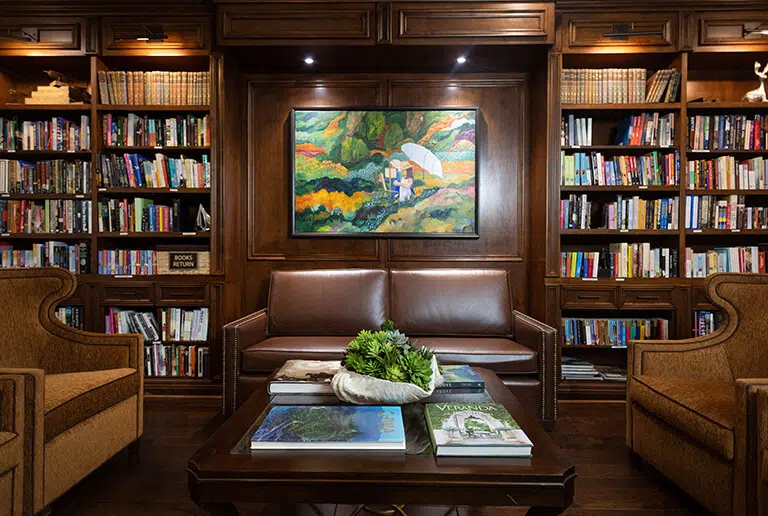 Interior view of a cozy library with seating