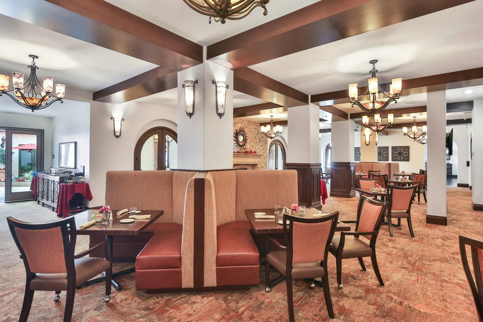 Bright dining area with cozy booths and decor