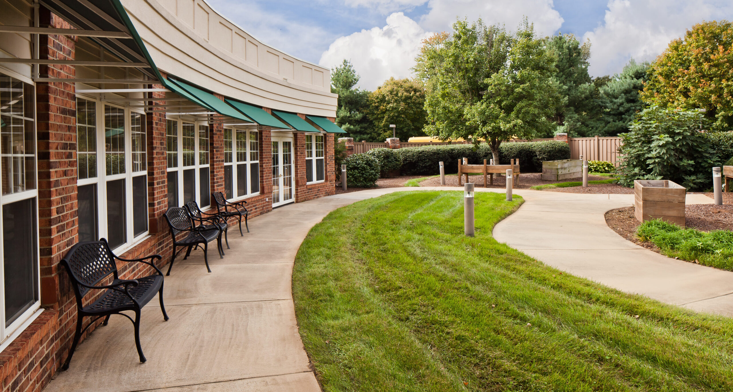 Pathway through a well-maintained garden area