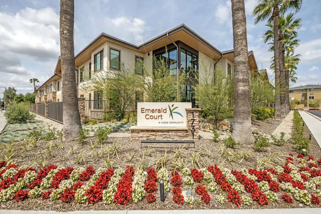 Exterior view of Emerald Court senior community building
