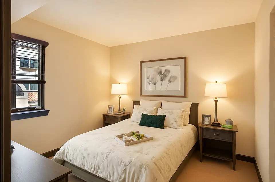 Cozy interior of a private resident room with a bed