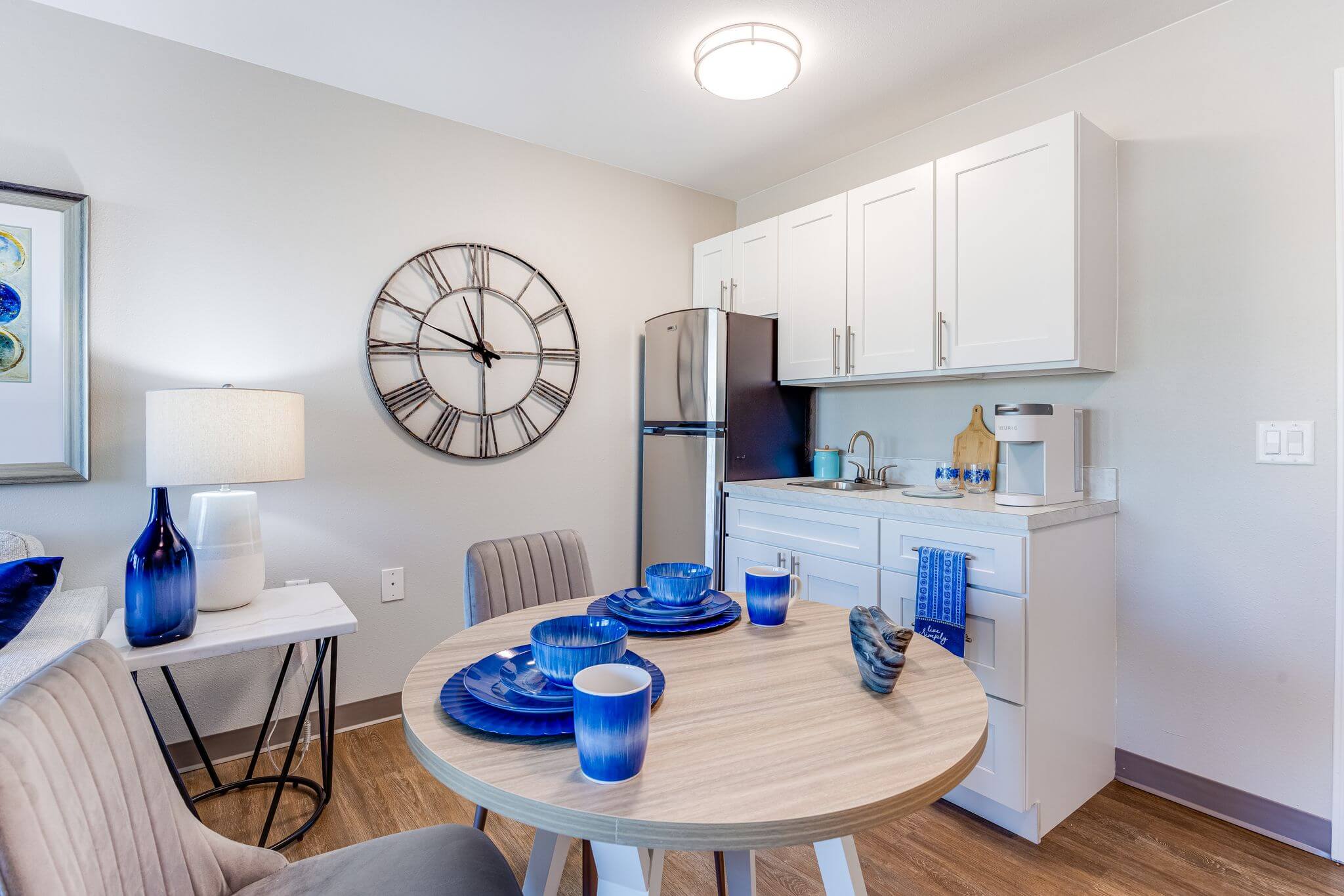 Cozy kitchen area in a resident room with a dining table