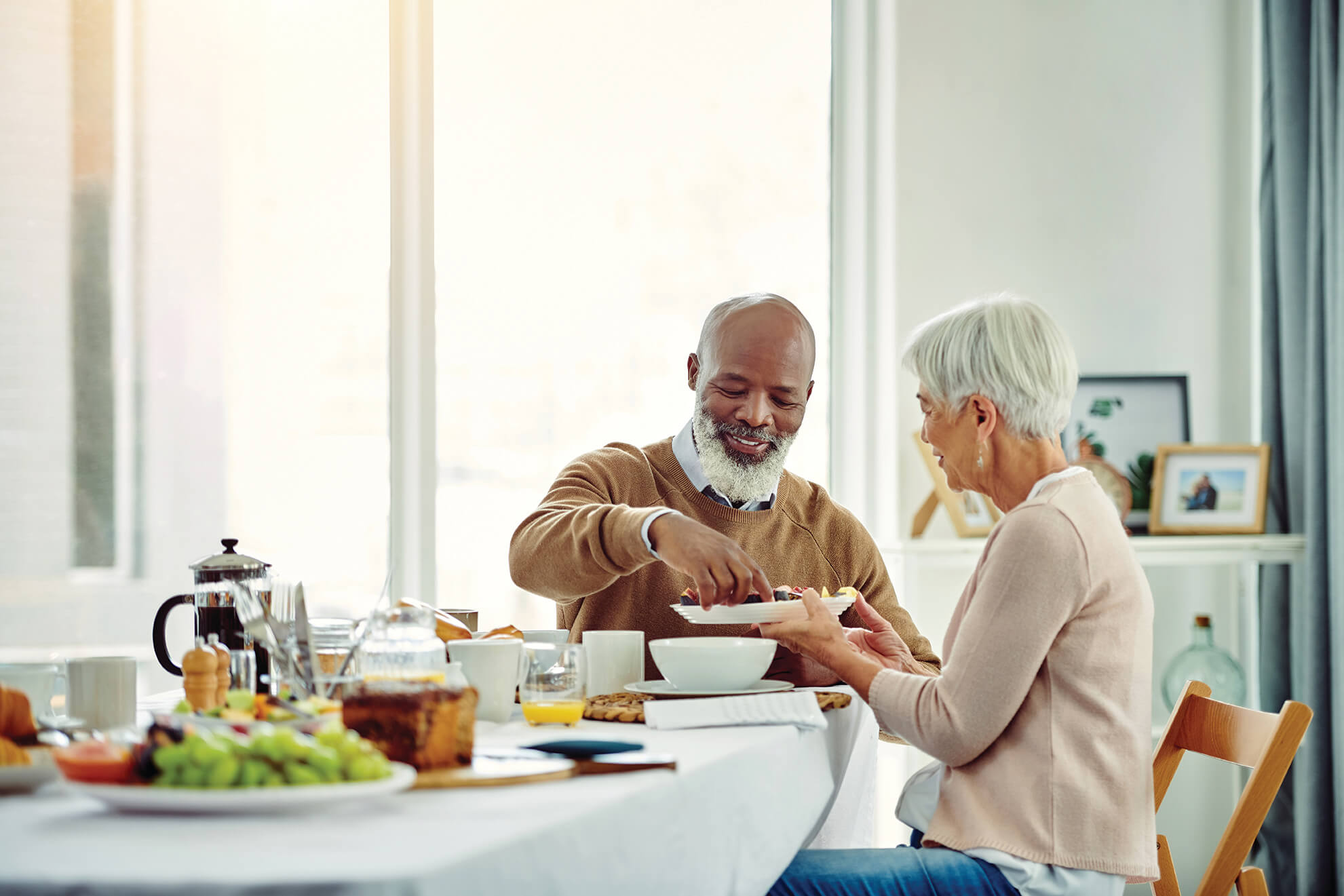 Residents enjoying a meal together in a dining area