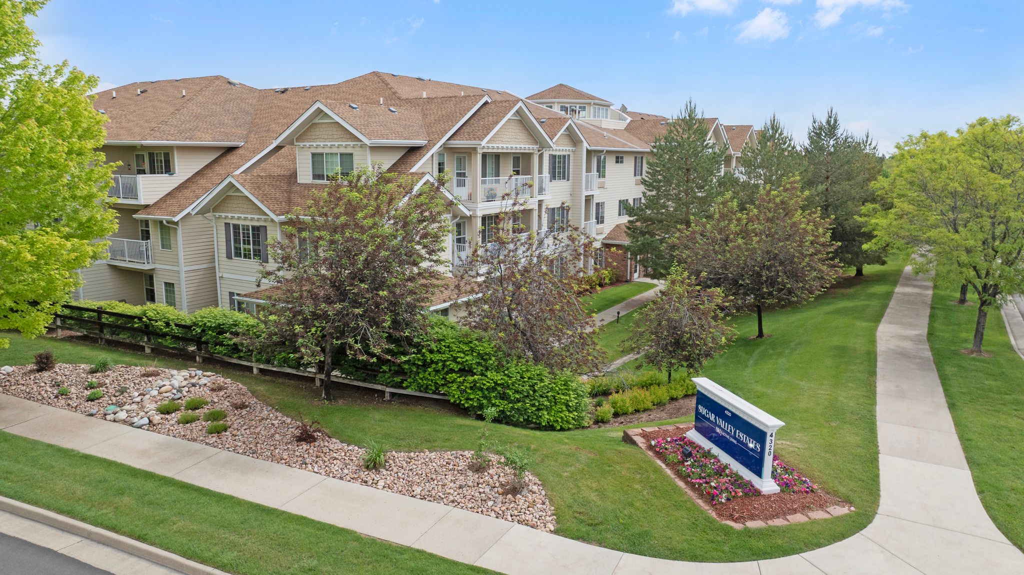 Exterior view of Parkwood Estates with landscaping