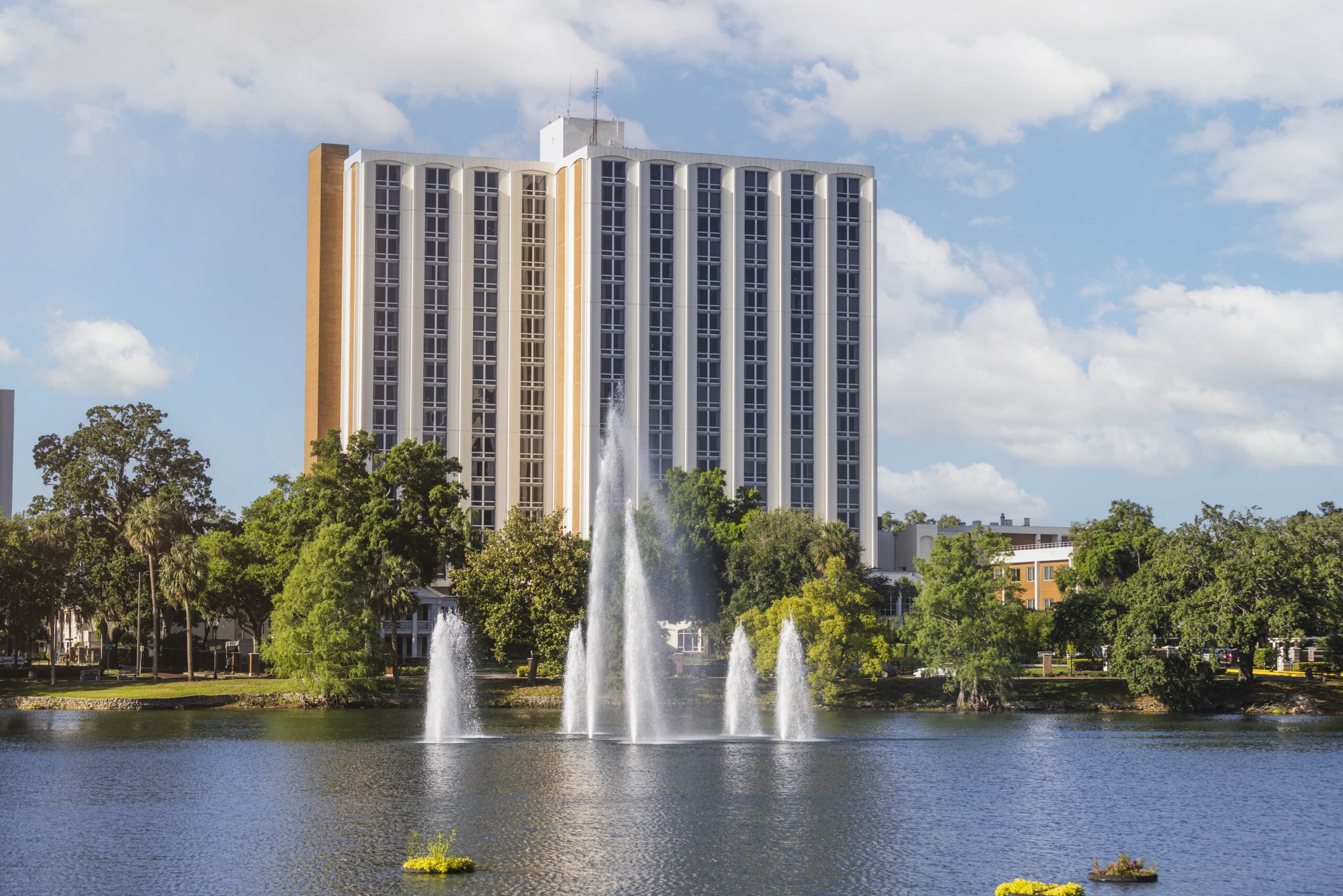 Exterior view of Westminster Towers by the lake