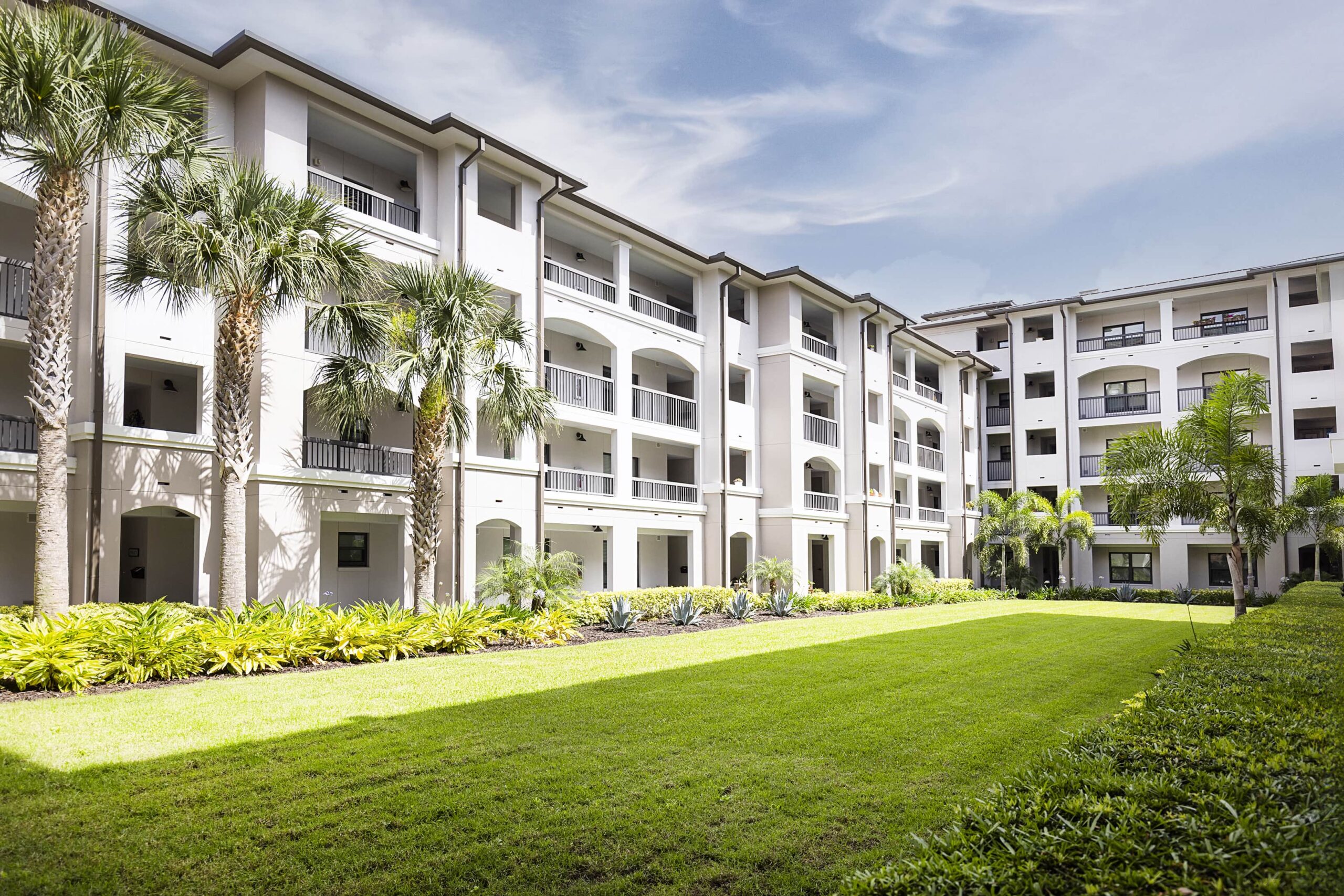 Outdoor view of a landscaped area with residential buildings
