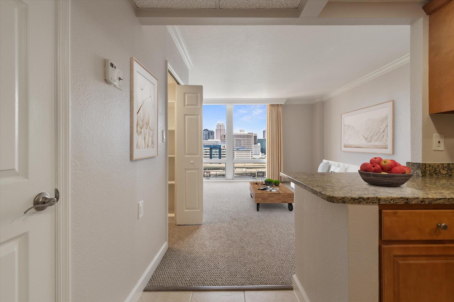 Bright, spacious living area with city views