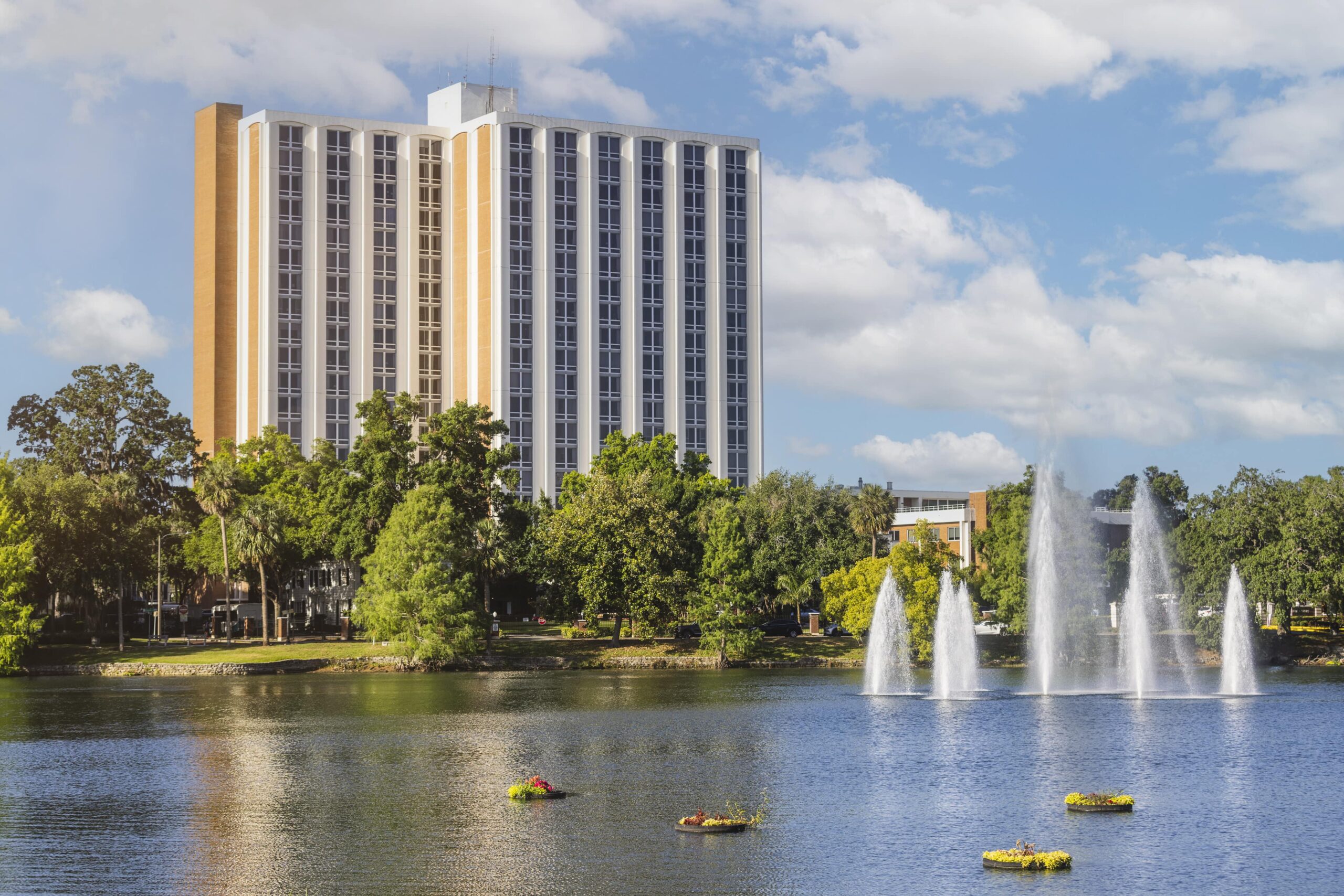 Exterior view of Westminster Towers by the lake
