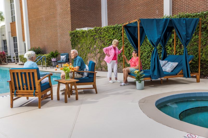 Residents socializing by the poolside