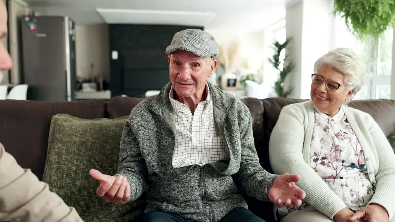 Two residents engaging in conversation in a lounge area