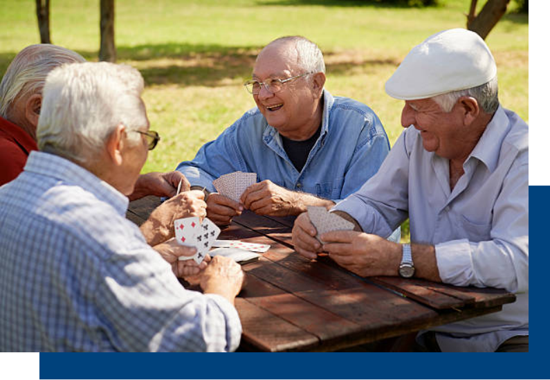 Seniors enjoying a card game outdoors