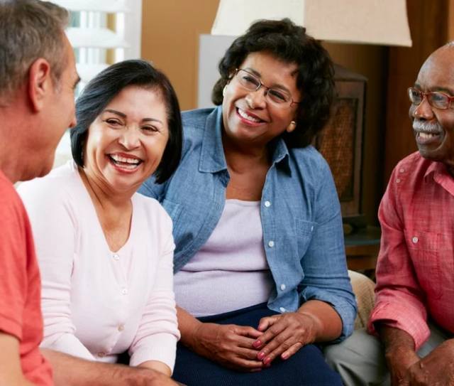 Residents enjoying a conversation in a common area