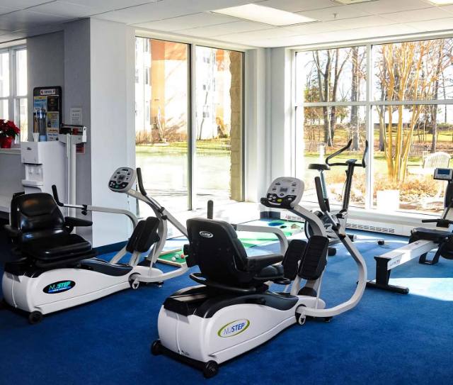 Fitness equipment in a bright exercise room