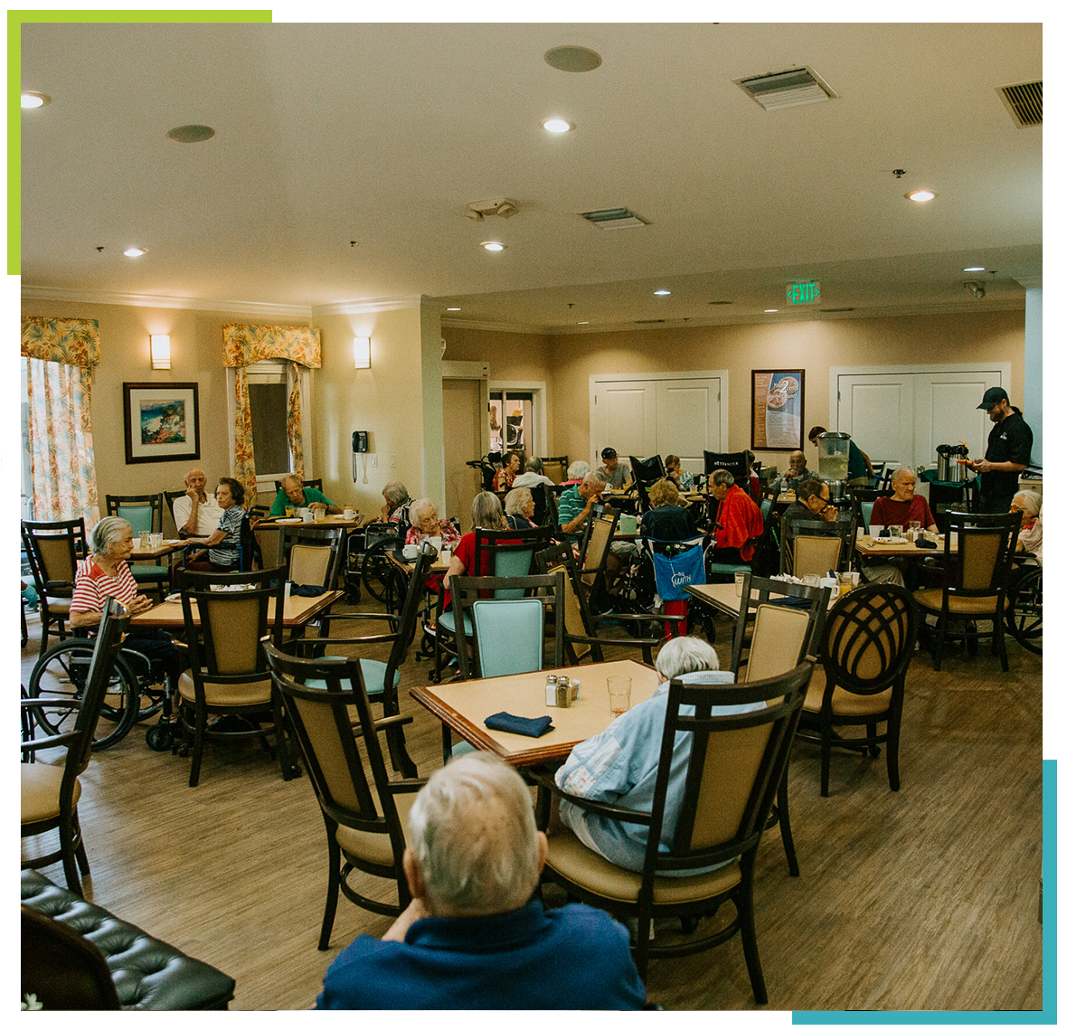 Residents dining in a common area of the facility
