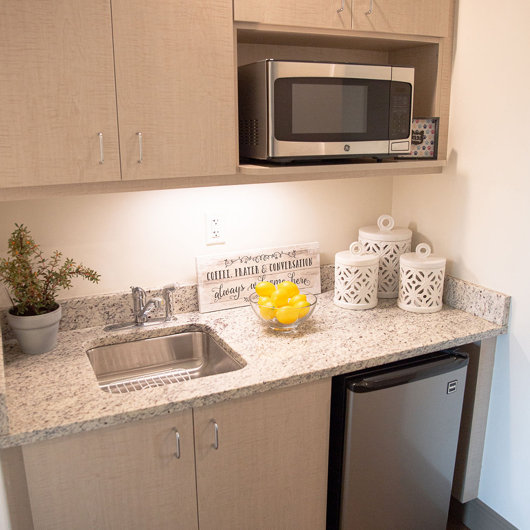 Cozy kitchen nook with modern appliances and decor