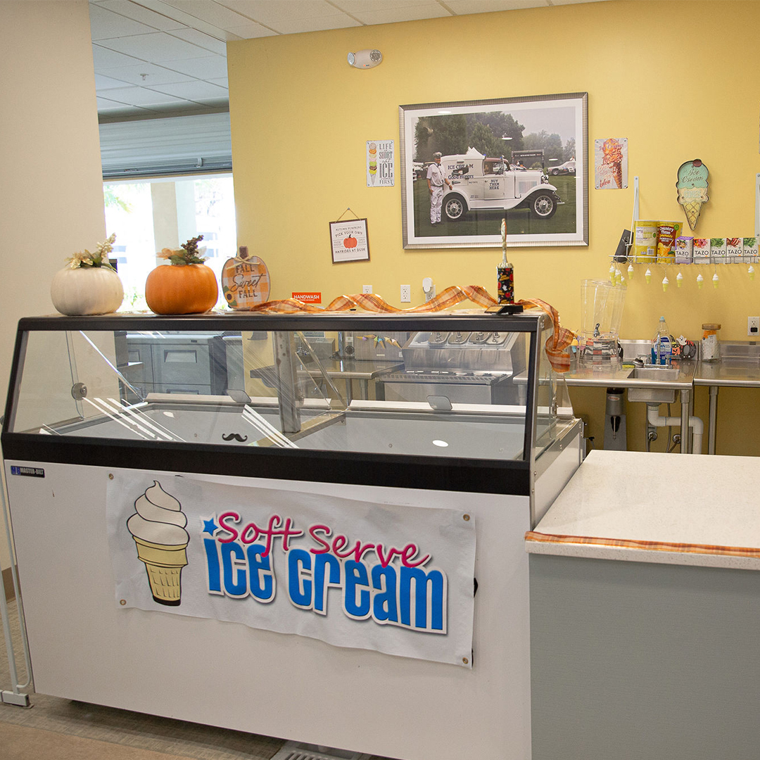Ice cream serving counter with soft serve sign