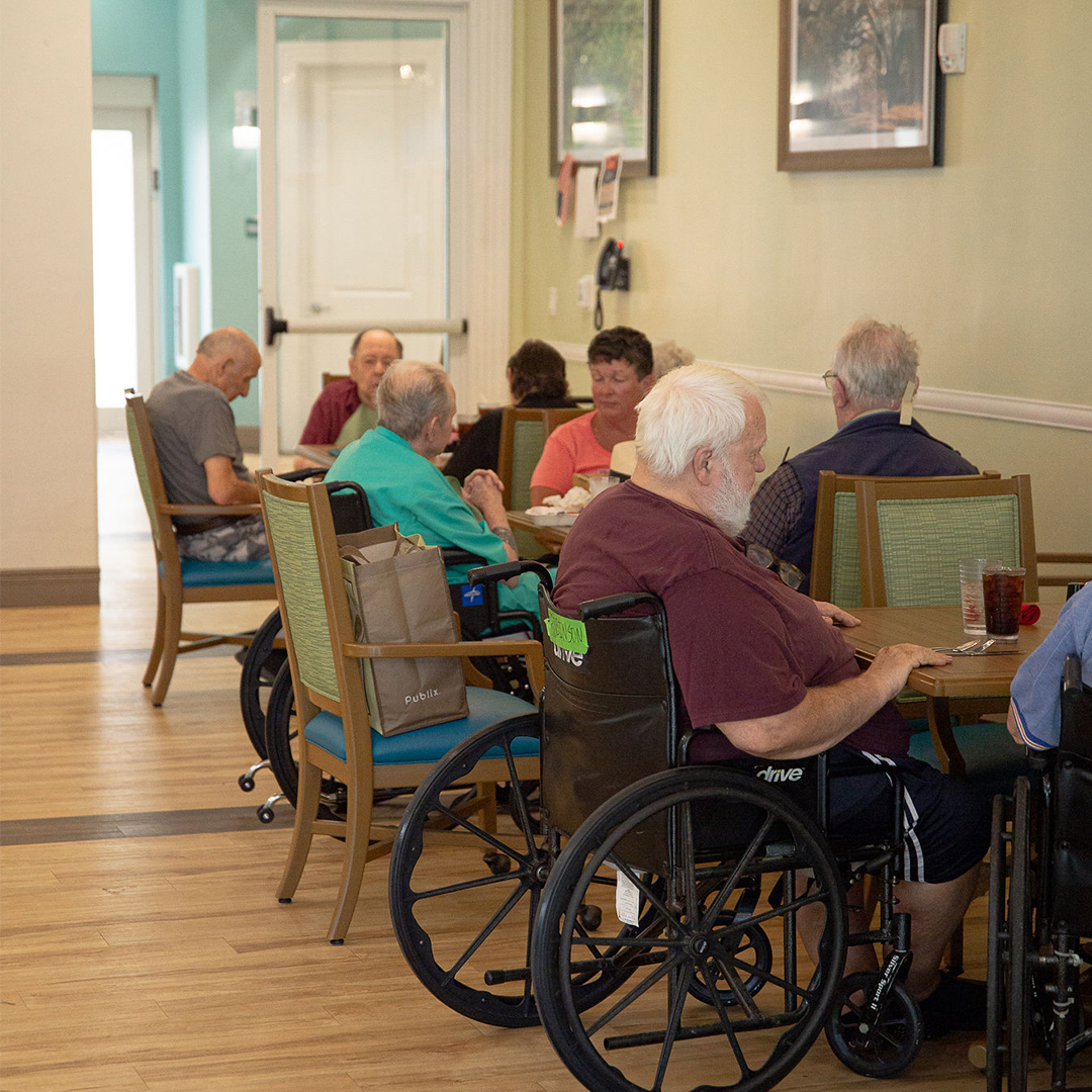Residents enjoying a meal in the dining area