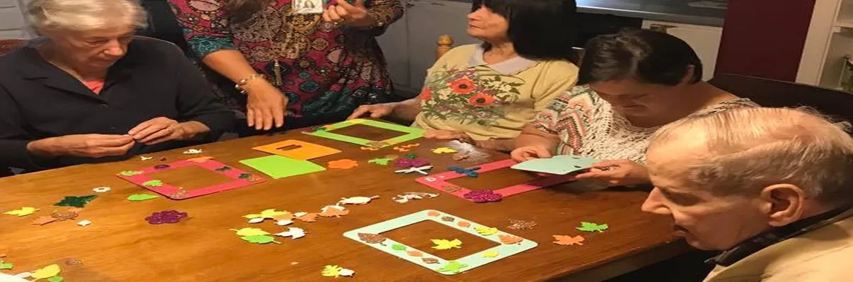 Residents engaged in an arts and crafts activity.