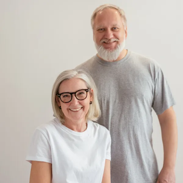 Smiling senior couple posing together