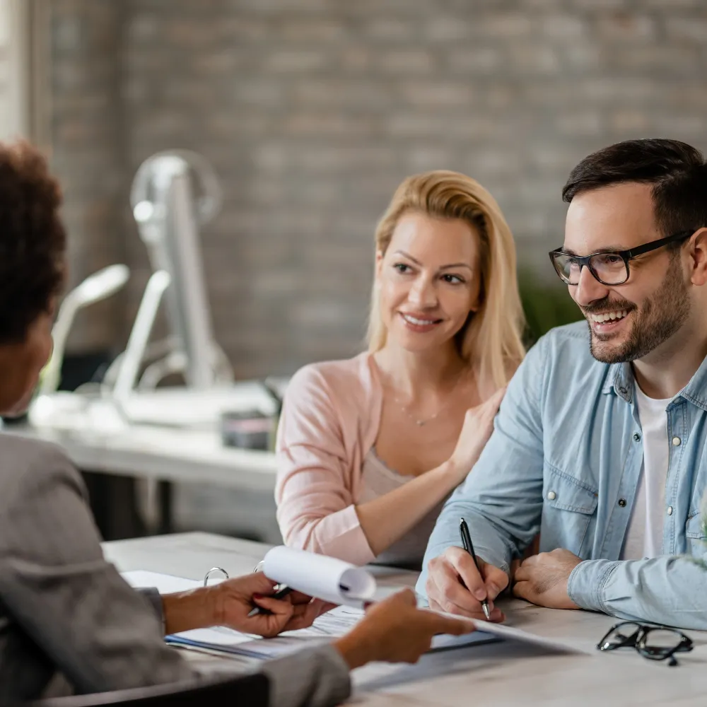 People engaged in a discussion in an office setting