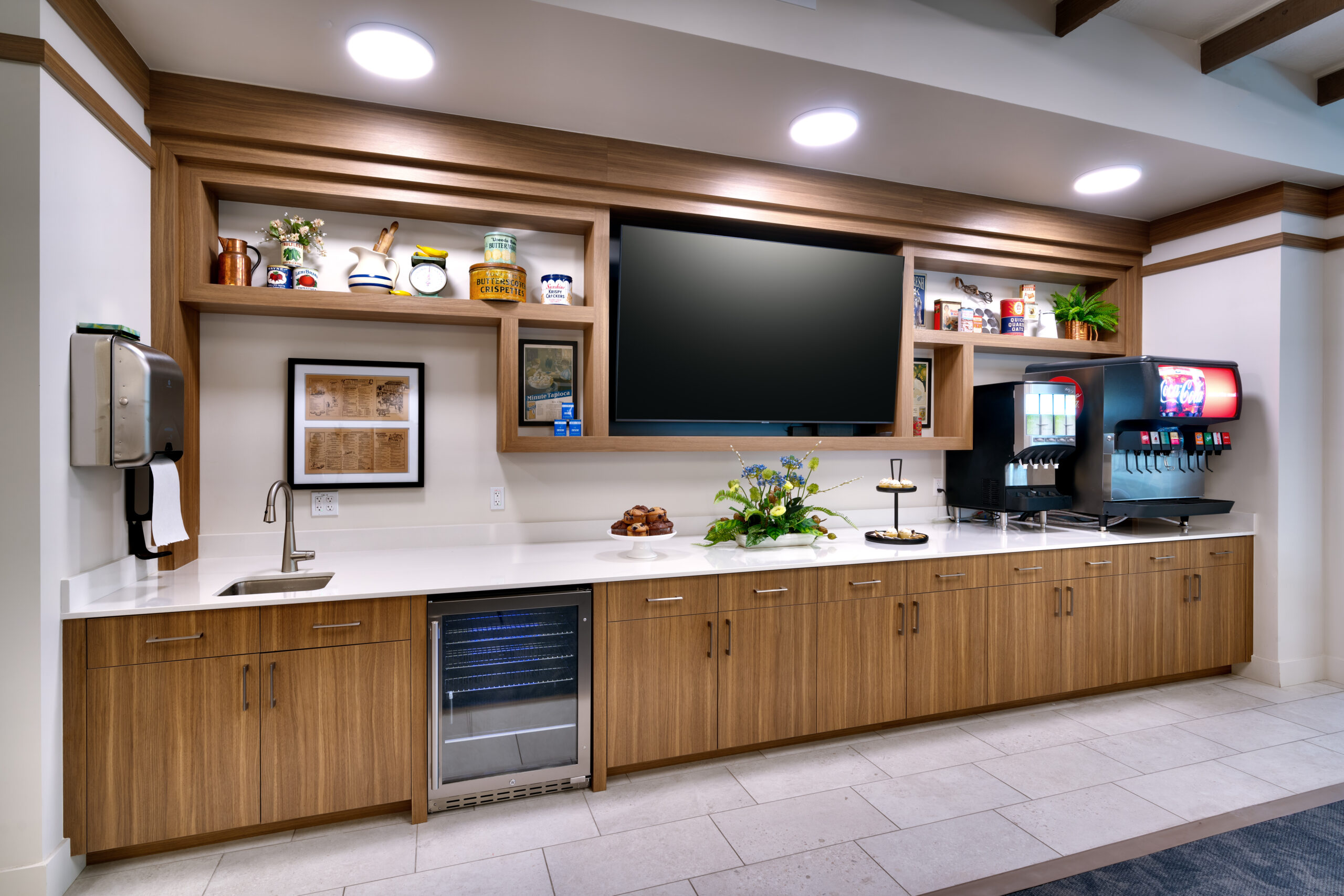 Interior kitchenette area featuring cabinets and appliances