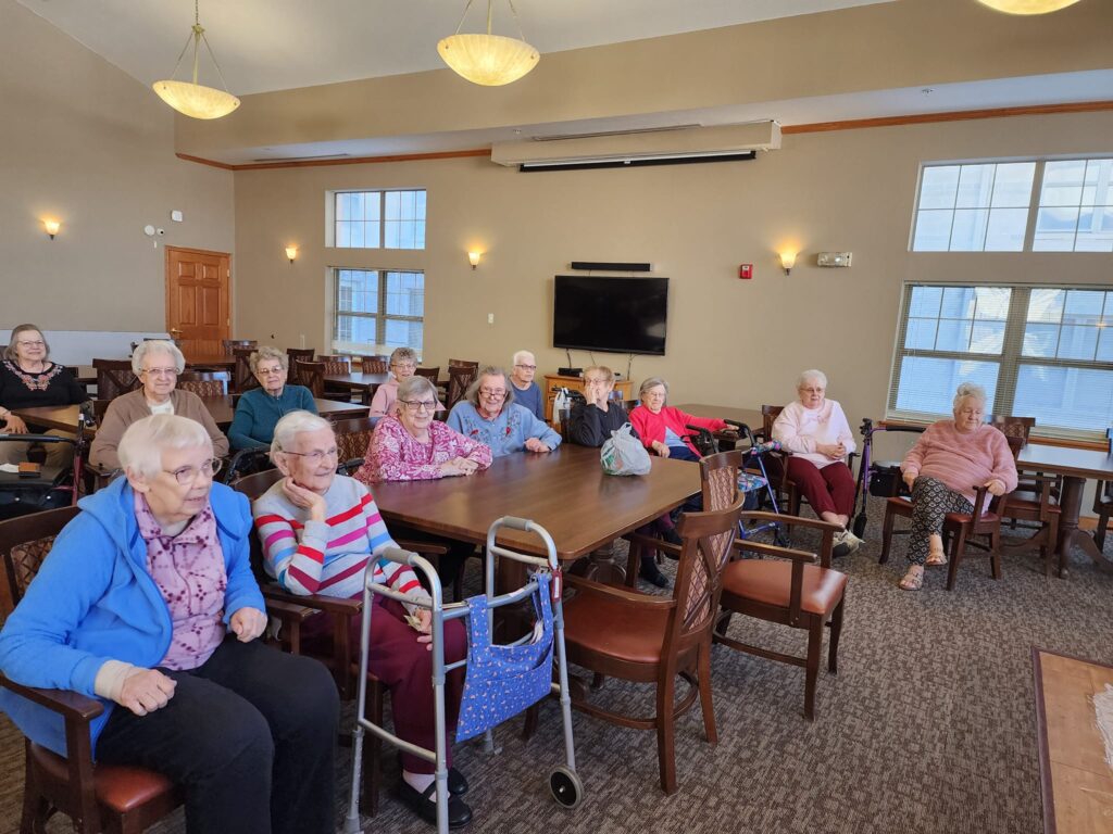 Residents enjoying a social gathering in a common area