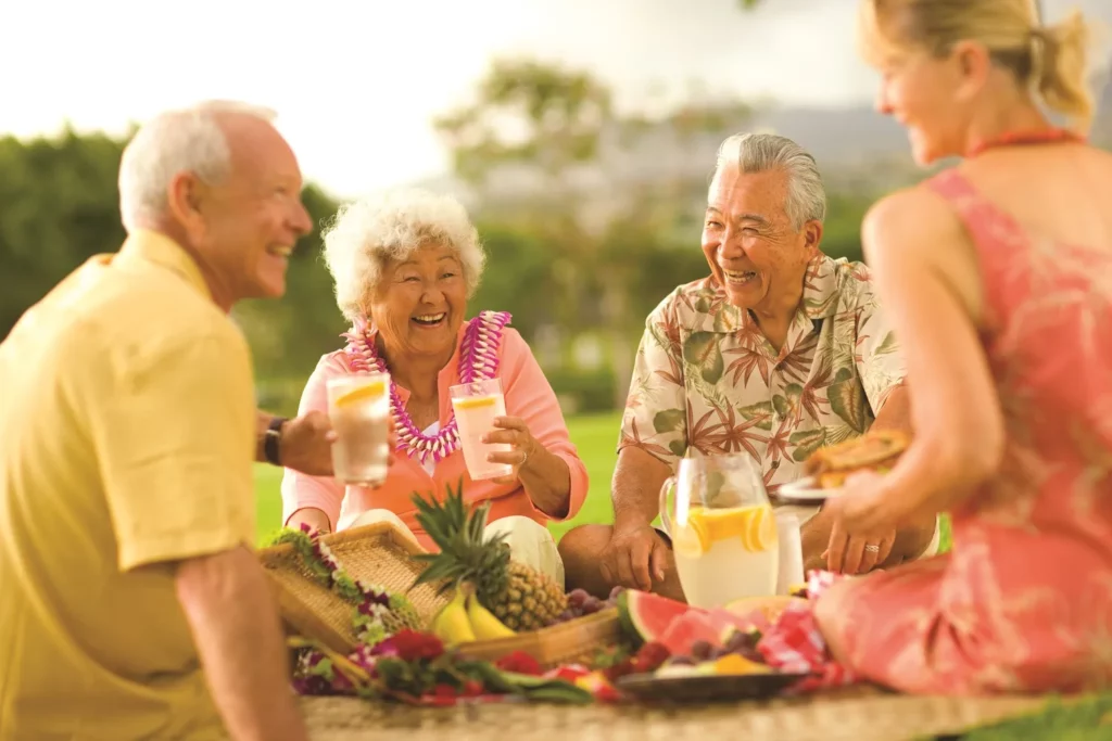 Residents enjoying drinks at an outdoor gathering