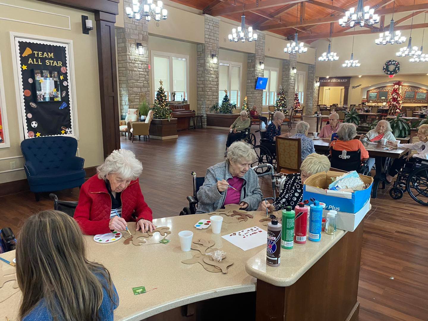 Residents engaged in a crafts activity.