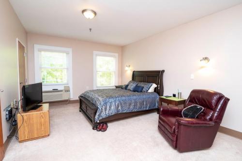 Private resident room with a bed and seating area.
