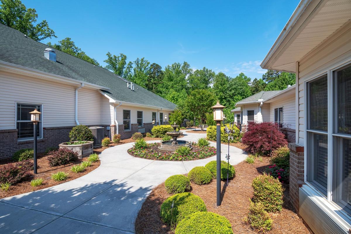 Beautifully landscaped courtyard with walking paths.