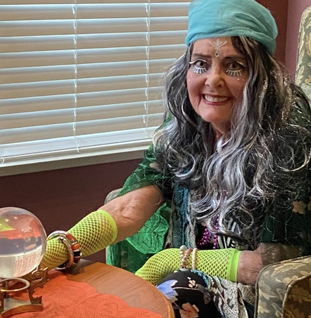 Resident engaged in an activity with a crystal ball.