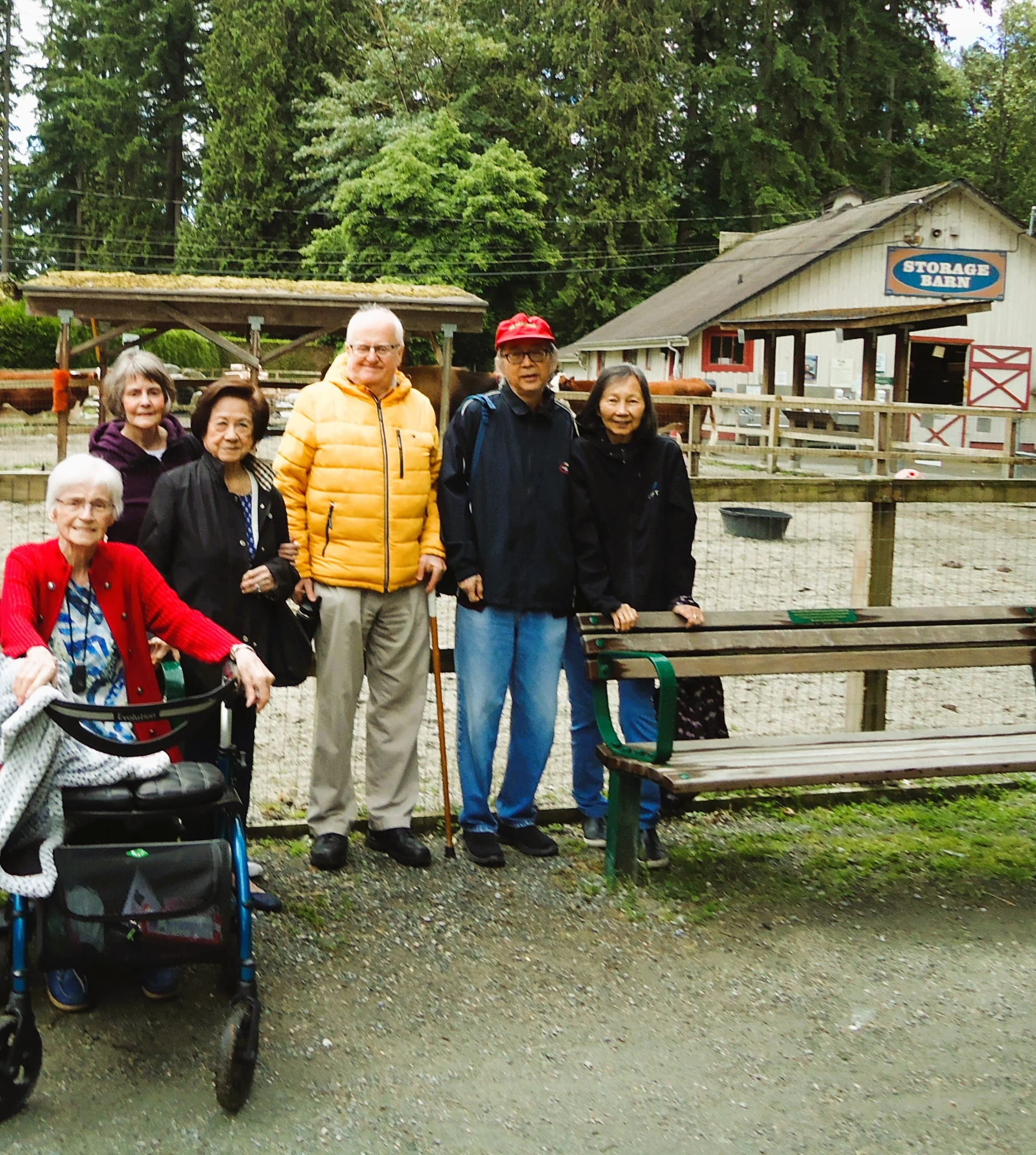 Residents enjoying an outdoor outing at a facility.
