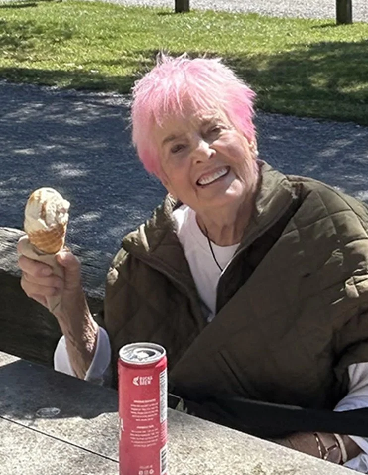 Resident enjoying ice cream outdoors in the sun