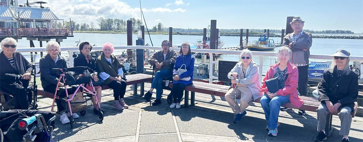 Residents enjoying a day out by the waterfront.