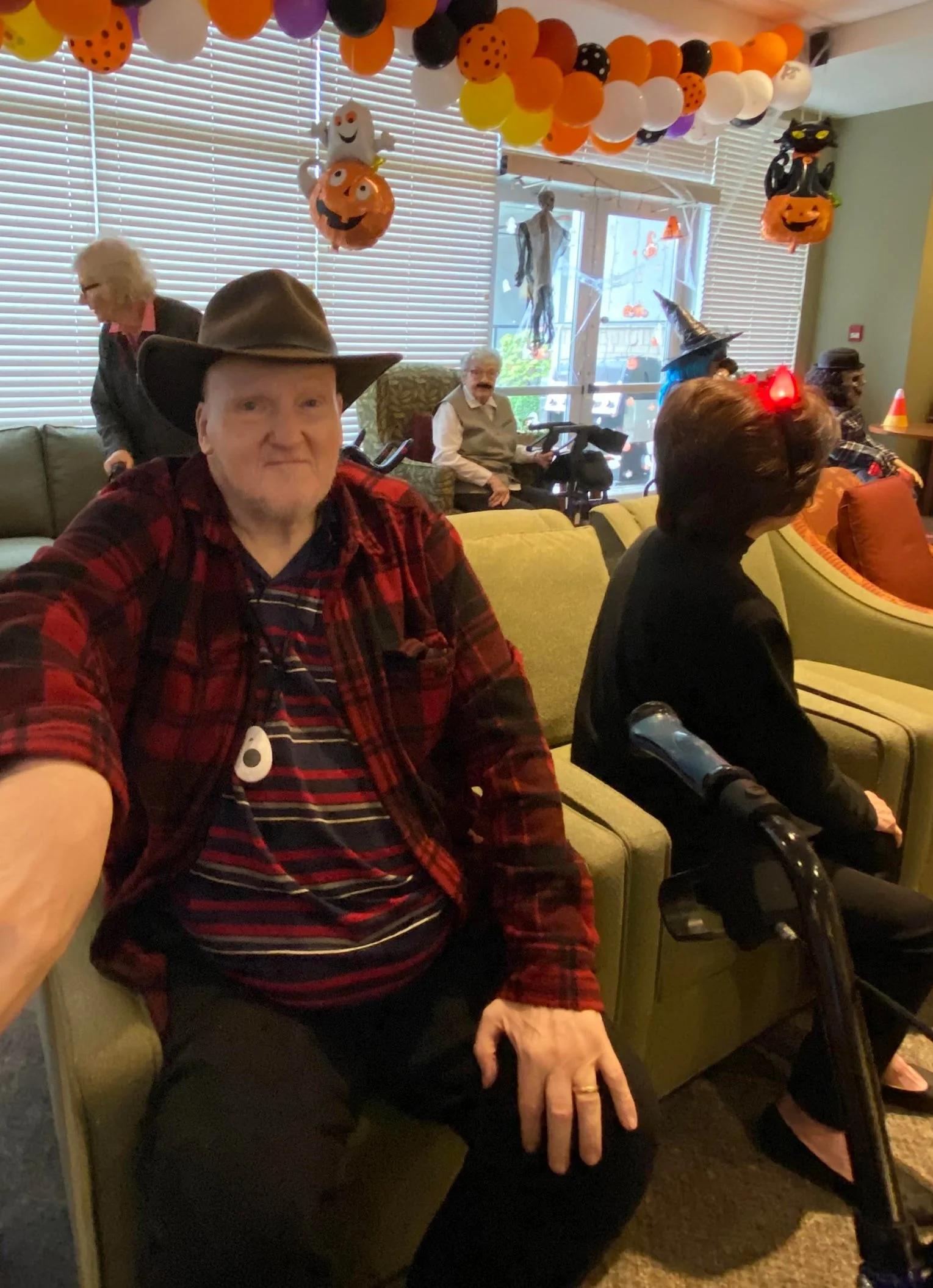 Residents enjoying a festive gathering indoors.