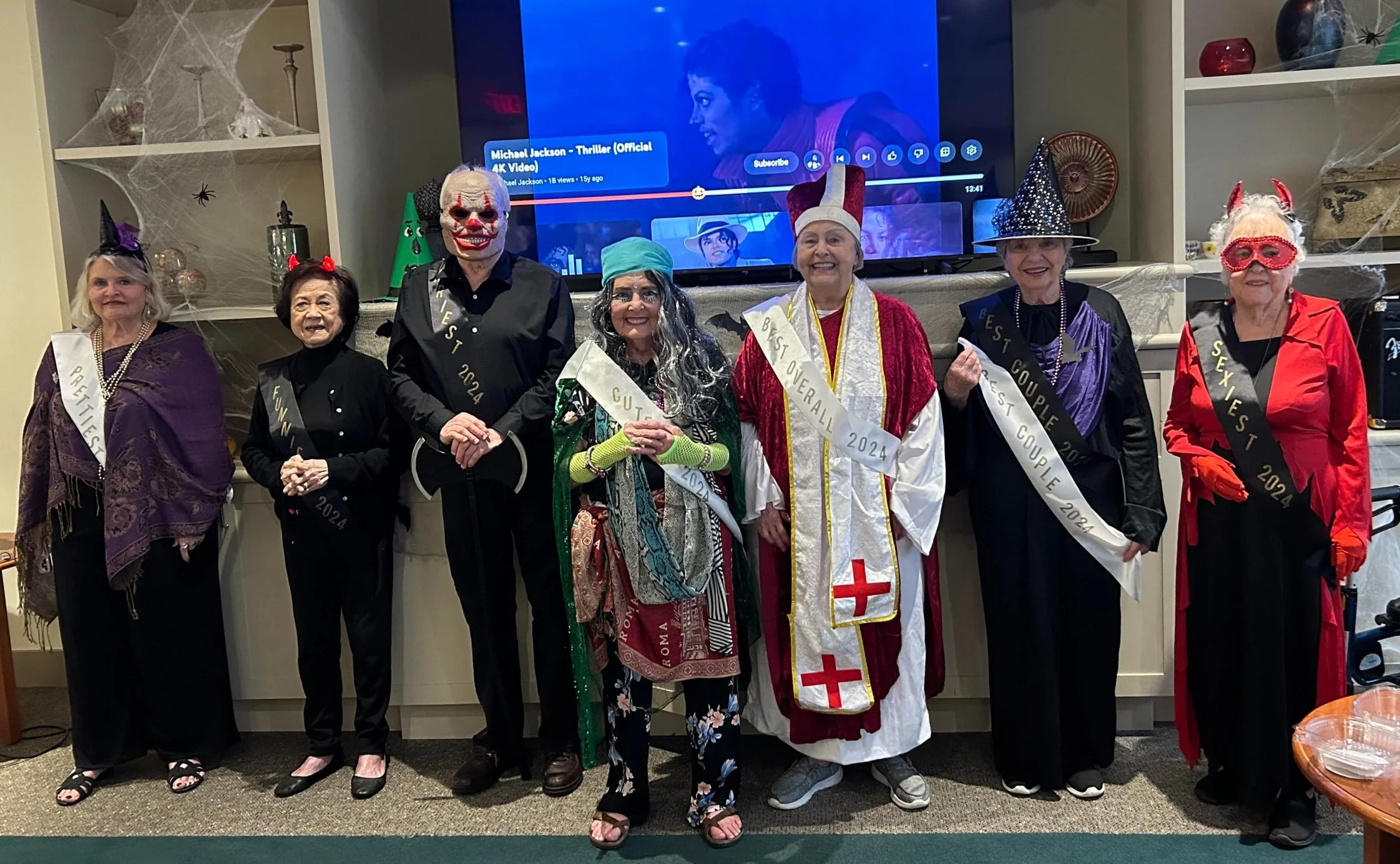 Residents participating in a festive costume activity.
