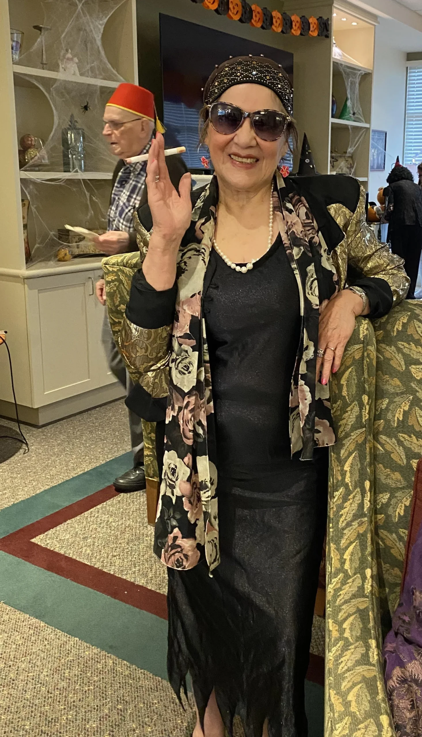 Resident enjoying a festive celebration in the common area.