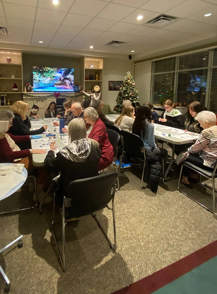 Residents engaged in a group activity during the holiday season.