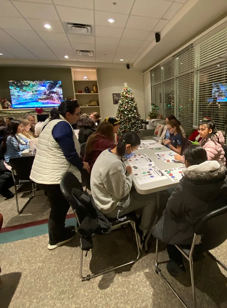 Residents engaging in a group activity during the holiday season.