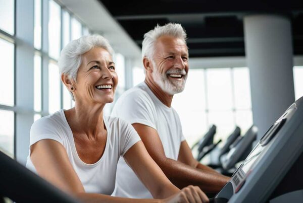 Active seniors exercising together in a gym