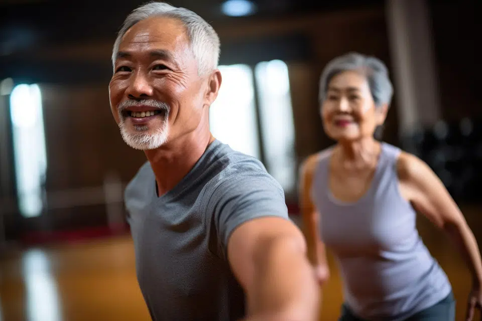 Seniors participating in a group exercise class