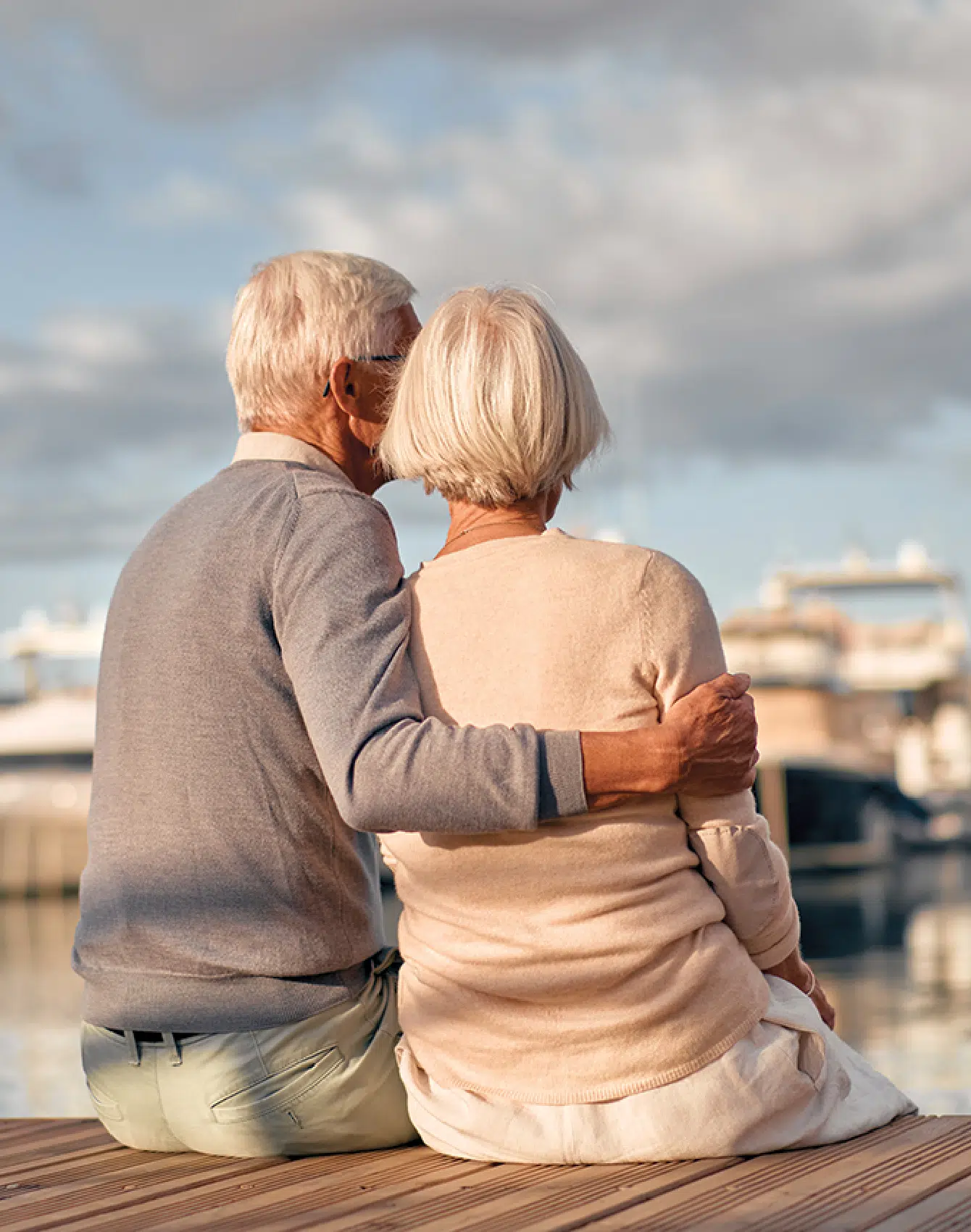 Senior couple enjoying a peaceful moment by the water